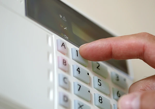 Keypad of a professionally installed burglar alarm system in Boca Raton, FL, for maximum security.