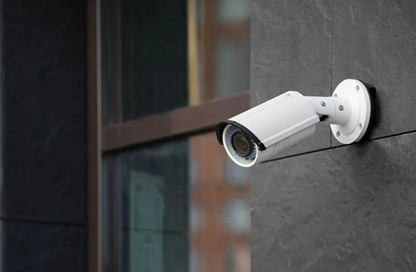 Outdoor security camera mounted for property surveillance in Stuart FL.