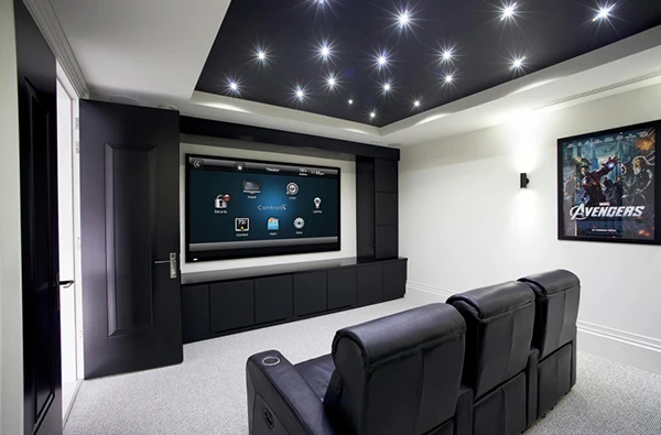 Luxury home theater with projector and surround sound.