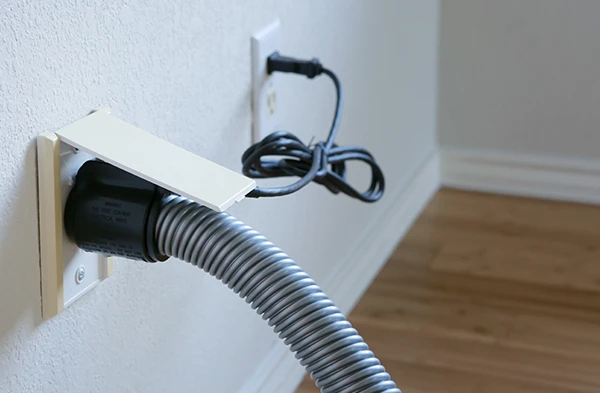 Central vacuum system wall outlet installed for efficient home cleaning in Stuart FL.