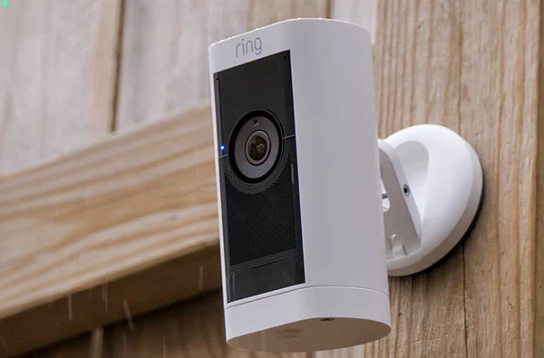 Ring security camera installed on a home exterior for enhanced surveillance.