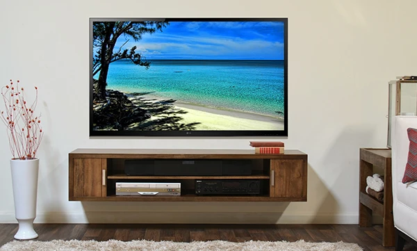 Professionally mounted television in a modern living room creating an entertainment space.