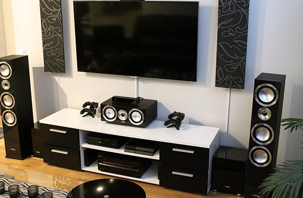 Modern home theater sound system with speakers and TV professionally installed in Wellington FL.