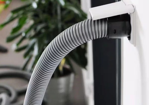 A central vacuum system outlet installed in a modern Delray Beach, FL home, providing powerful and efficient cleaning