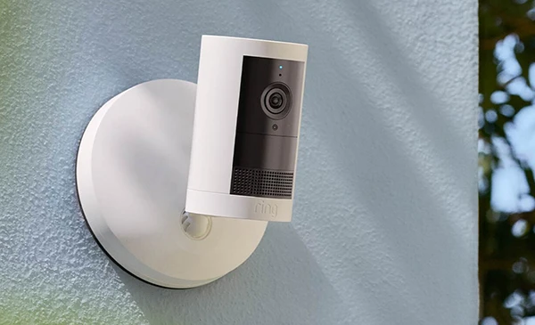 White Ring security camera installed on exterior wall, highlighting professional Ring camera installation services in Palm Beach Island, FL.