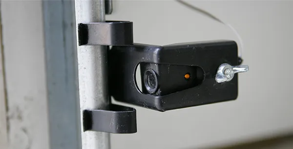Garage door sensor installation ensuring safety and remote access on Palm Beach Island FL.