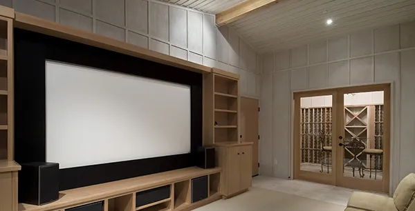 Home theater seating and screen installation with advanced projector setup in Boca Raton FL.