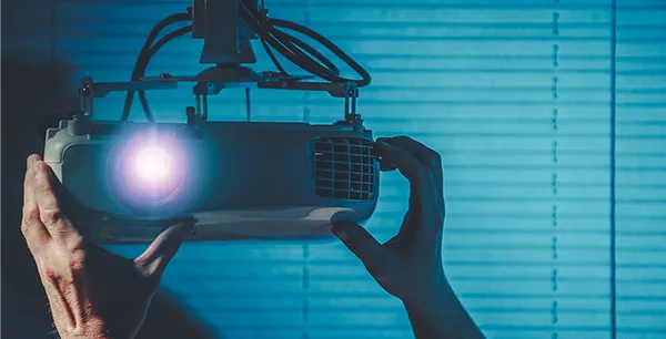 Virtual reality headset user showcasing surround sound and projector home theater installation in Fort Lauderdale FL.